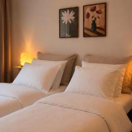 Central location with sauna, private yard & parking