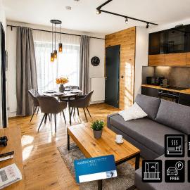ENJOYHARRACHOV - Atraktivní slunný klimatizovaný apartmán 24 v centru Harrachova s velkou terasou, saunou, parkováním, Wifi-WLAN, SAT, herní konzolí, Netflix zdarma a možností dobíjení auta jen 150m od lanovky