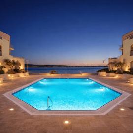 Beachfront Apt with Pool Access