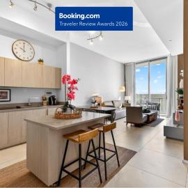 Wake Up to the Sound of Waves in a Stylish Condo in a Luxury Resort