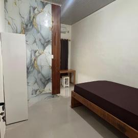 Kos Pramuka, hotel in Sunggal
