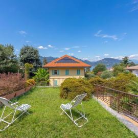 Sunset in Ranco: Lakeview Townhouse with Private Garden - Happy Rentals