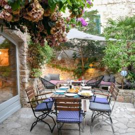 Charming Stone House with Green Courtyard