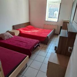 Lit dans une salle Bett im Zimmer, hotel di Mulhouse