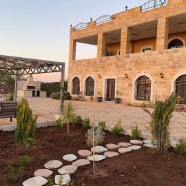 منتجع تل الربيع - Tal Al-Rabi Resort – hotel w mieście Adżlun