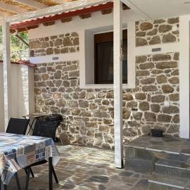 Stone house under a rock Kukos