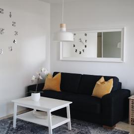 Central and cozy home by the train station with free parking