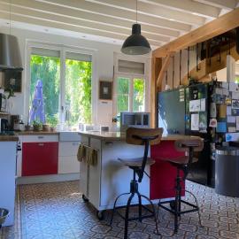 Maison sous le signe de l'art et de la verdure