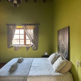 Casona La Orilla 1908 Tías, מלון בטיאס