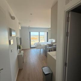 New CP Victory Suites studio with runway view, pool and gym