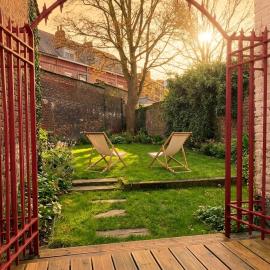 Cocon T2 avec jardin, Terrasse & Climatisation en plein centre-ville, à deux pas du métro et de la gare TGV, hotel a Tourcoing