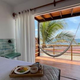 Apartamento con terraza frente al mar