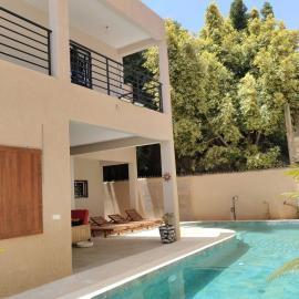 Villa neuve tropicale avec piscine privée à Saly