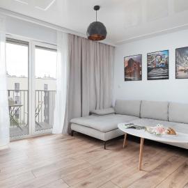 Comfortable Apartment with Balcony and Private Parking Space by Noclegi Renters