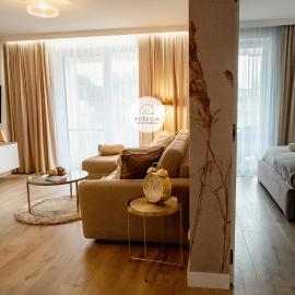 Posesja Plażowa SAND APARTMENT & SPA by POSESJA APARTAMENTY Grzybowo、グジボボのホテル