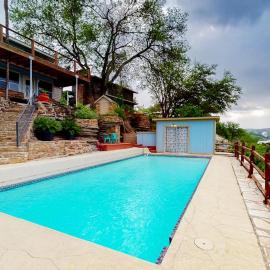Mid-Century Modern Lake House with Private Waterfront Pool & Boat Dock