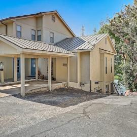 Dog-Friendly Water View Condo with Inviting Porch, AC, W/D, & Modern Charm