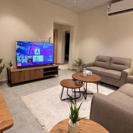 هوزان للإقامة b12 - شقة بدخؤل ذاتي غرفتين نوم وصاله معيشة, hotel in Unayzah