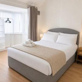 Stylish 4-Bedroom Home with Parking, Minutes from the NEC & Airport