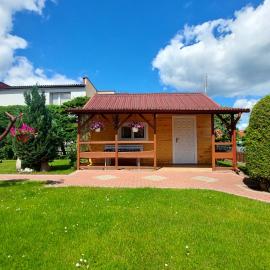 Drewniany Domek Letniskowy, hotel in Ruciane-Nida