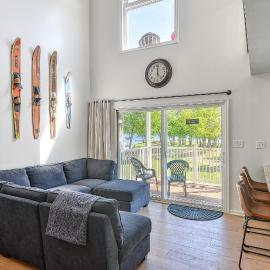 Three-story lakefront home w/ covered boat slip, and tennis/pickleball access, hotel a Mineral