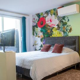 Suite Touraco, clim, balneo, terrasse - Parc des Oiseaux، فندق في فيلار-ليه-دومب