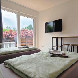 Dream&Stay - Boardinghouse Oldenburg - Zimmer 5 - Balkon - WLAN - Parken, hotel in Drielakermoor