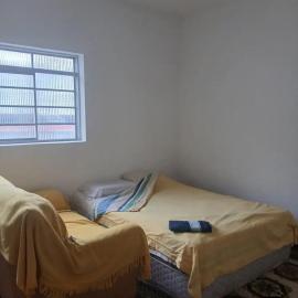 Quarto Aconchegante no Centro de Poços de Caldas - Pousada do Chico, hotel in Poços de Caldas