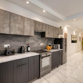 Urban Haven - Stylish 2BR Apartment with Lift & Balconies