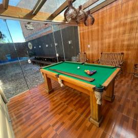 Casa com 2 quartos, piscina c aquecimento solar, sinuca e churrasqueira perto da praia、トラマンダイのホテル