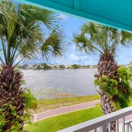 Upscale condo with pools private beach access hot tubs & tennis - dog-friendly