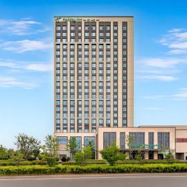 Holiday Inn Qidong Lvsi Port by IHG, хотел в Qidong