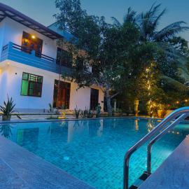 Blue Orchid Villa، فندق في تالبي