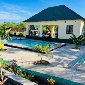 LodgeB at TrojanFarm, hotel din Nkhotakota