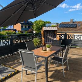 FeWo Auszeit eigene große Terrasse mit Strandkorb und Grill, hotel in Wesel