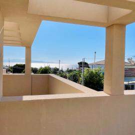 Kostas luxury Sea-View apartments near Airport and Beach, hotel in Artemida