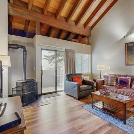 Lakefront retreat with shared pool hot tub & sauna - near shopping & skiing