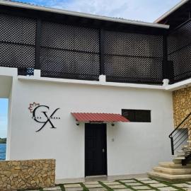 Casa de Playa Cerca de Isla de Flores con Acceso a Lago Peten, hotel a San Benito