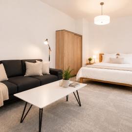 Viesnīca ALURE RESIDENCES 2 - 24h self check-in & private parking next to the apartment building included, CITY CENTER right on SNP Square in a quiet passage, new building, best deal in town pilsētā Banska Bistrica