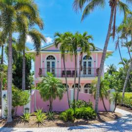 Waterfront Pink House with Private Dock & Pool