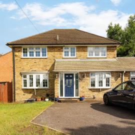 Spacious 4BR Home with Garden & Parking