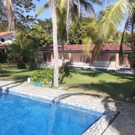 Beach property in tropical garden