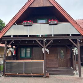 Agroturystyka FIFI Domek drewniany z 2 sypialniami, hotel di Młynary