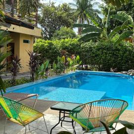 Jungle pool house Bird mural Ricaurte