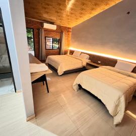 Hotel Suites Bambú, ξενοδοχείο σε Minga Guazú