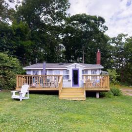 Dog-friendly Fisher Hill home with patio and wood stove - walk to the harbor