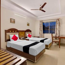 Capital O Elegant Amethyst Business Hotel Near Ragigudda Sri Prasanna Anjaneyaswamy Temple