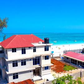 Beachfront Escape with Stunning Ocean Views, hotel em Uroa