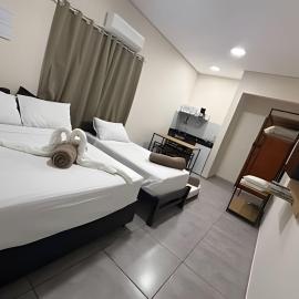 Estadia Perfeita com AC, Apto a minutos do Aeroporto Gru, hotel a Guarulhos
