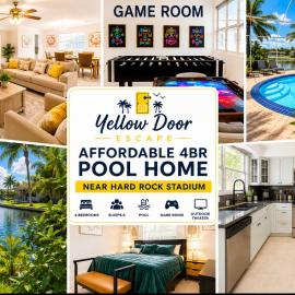 4bdrm Waterfront salt water Pool home with Outdoor theater Game Rm Make up vanities in every room Perfect for Game days and concerts trips to Miami Hard rock stadium and hotel 15 mins away – hotel w mieście Miramar